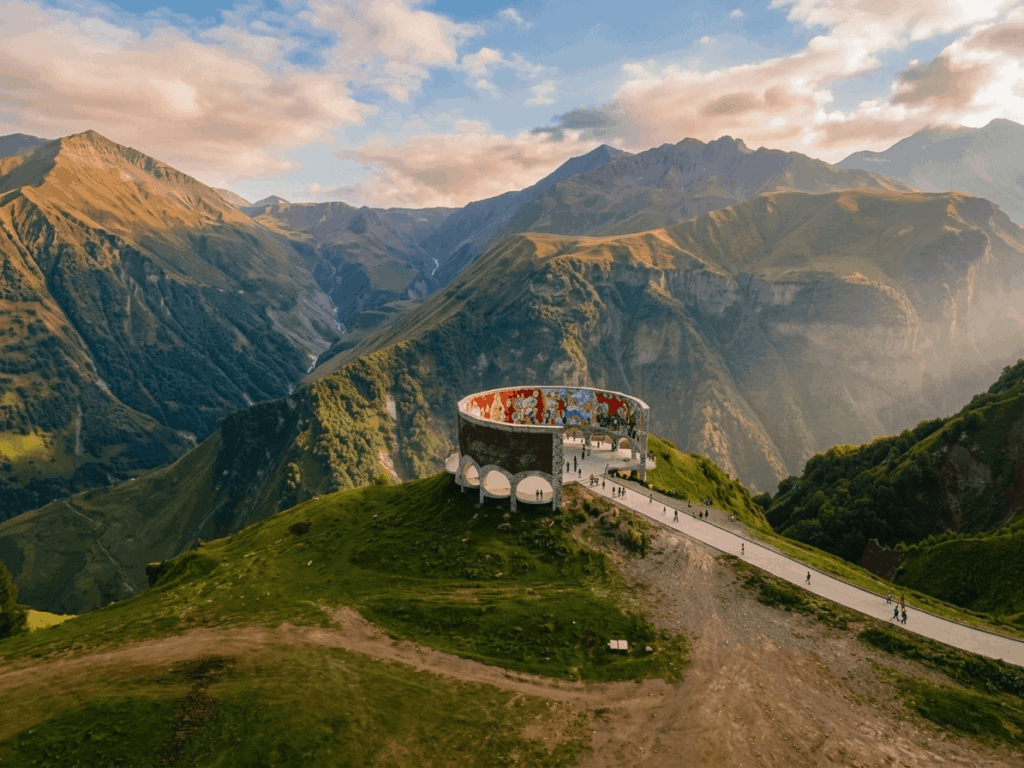 Gudauri Friendship Monument panorama view Caucasus mountains